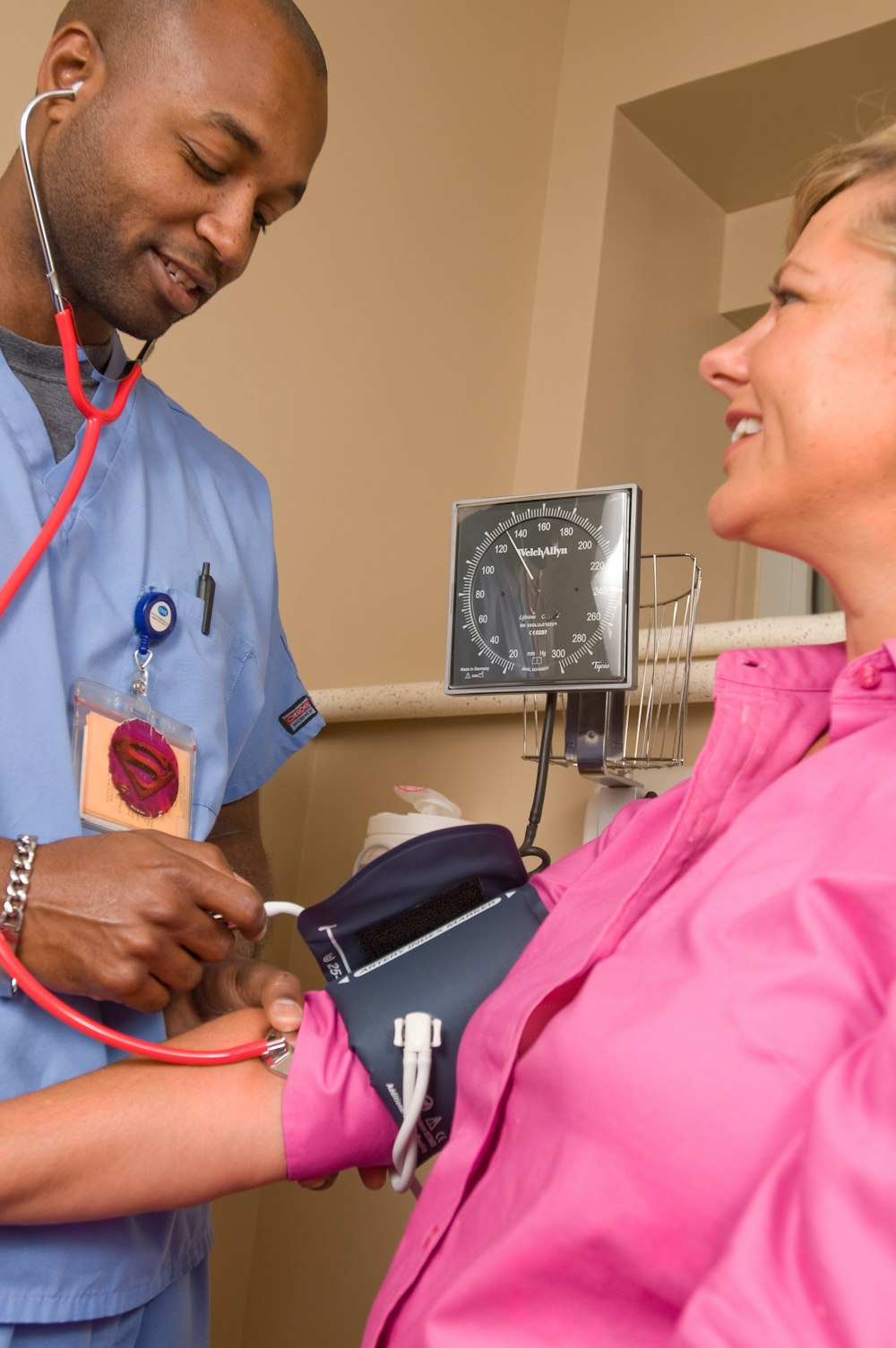 A laboratory technician reviewing blood test results for kidney function