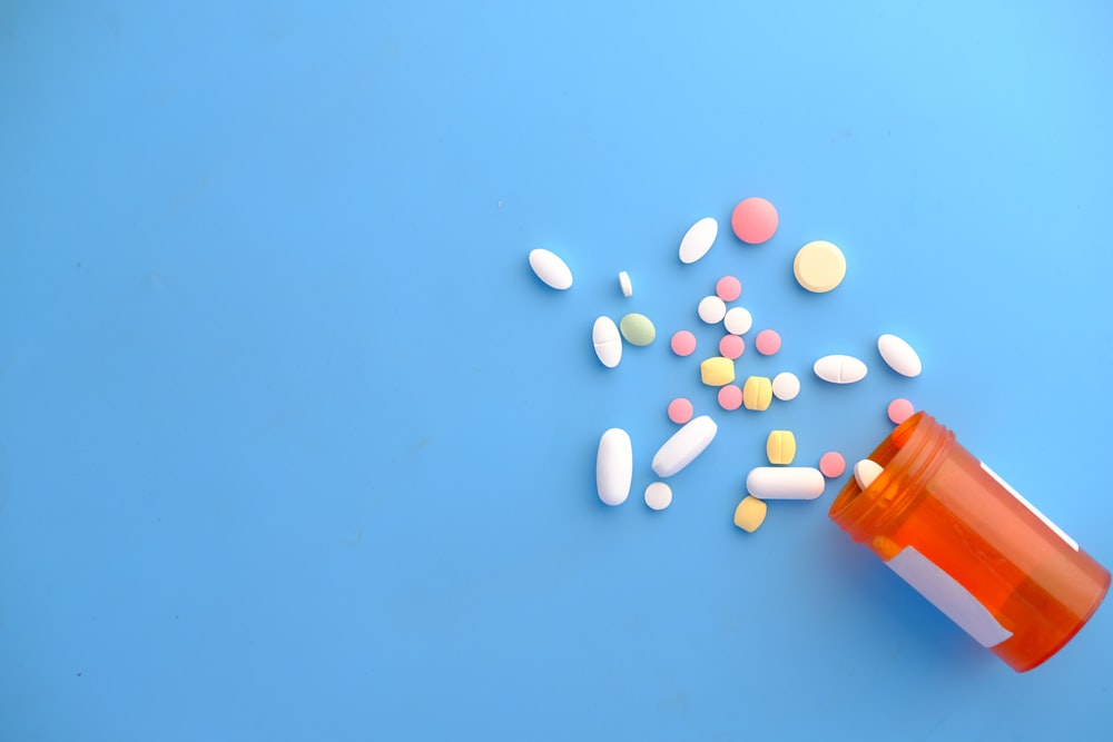 A weekly pill organizer with tablets sorted by day of the week