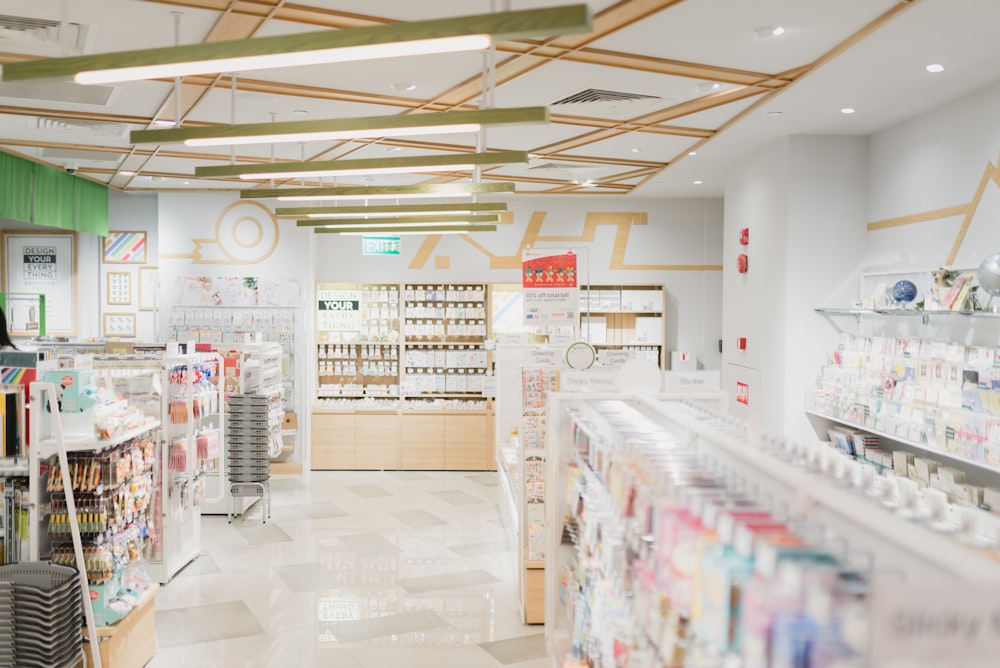 Over-the-counter pain reliever boxes on a pharmacy shelf